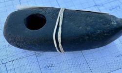 العثور على فأس من العصر البرونزي بشمال غرب روسيا